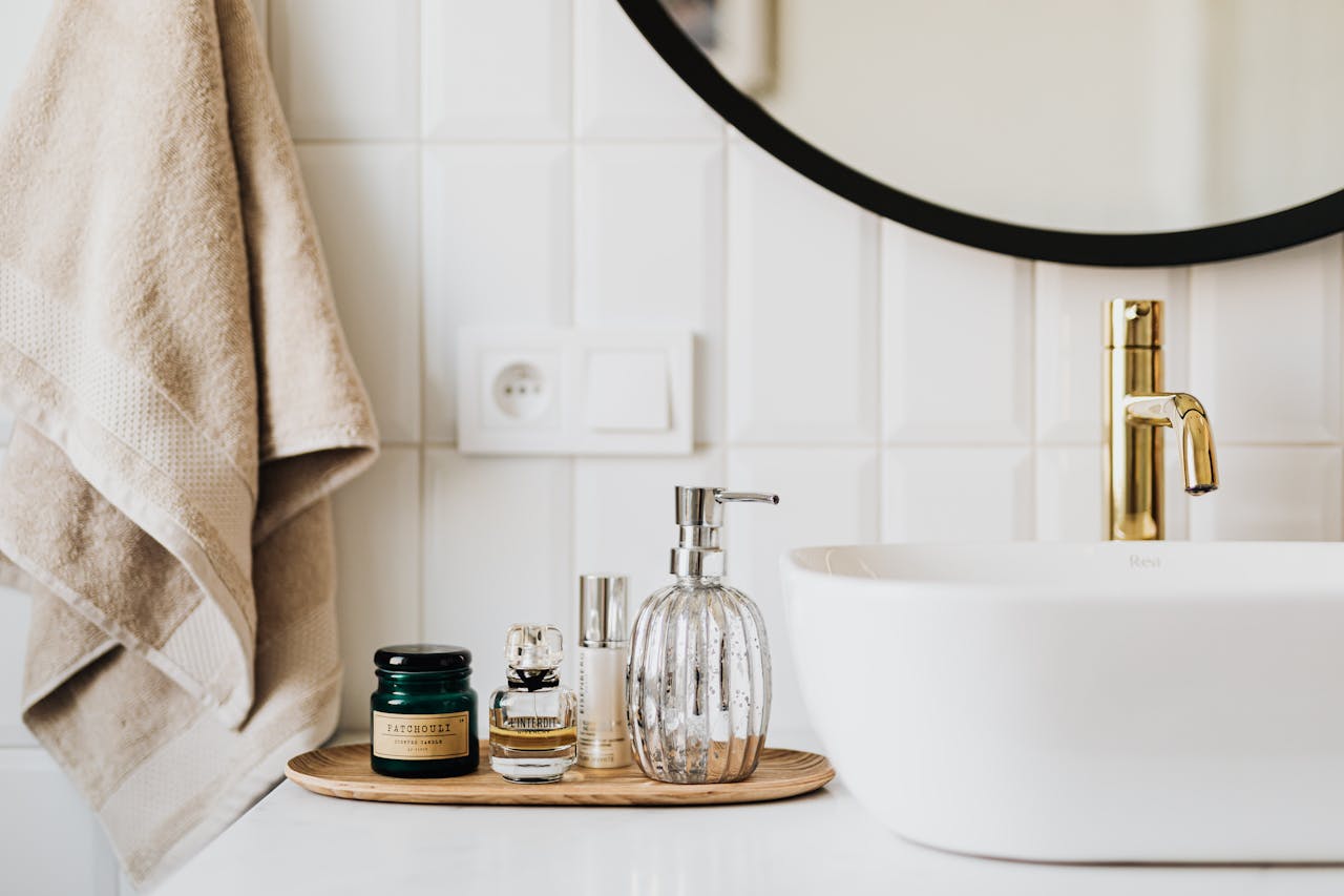 The Art of Drawing Readers In: Your attractive post title goes here A stylish bathroom sink with skincare products and accessories for modern living.